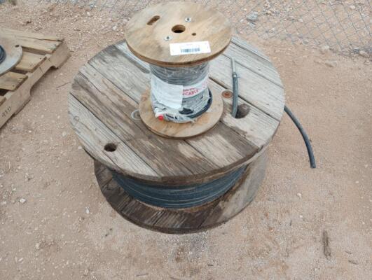 (1) Spool of Conduit, (1) Spool of Electric Cable