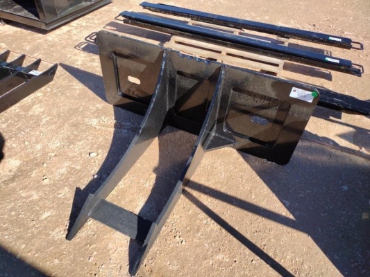 Unused Rock and Stump Digger (Skid Steer Attachment)