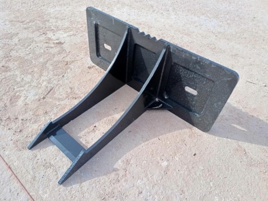 Unused Skid Steer Rock and Stump Digger