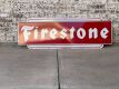 Large vintage Firestone advertising sign